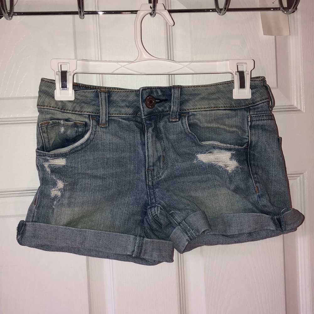Light washed ripped AE shorts